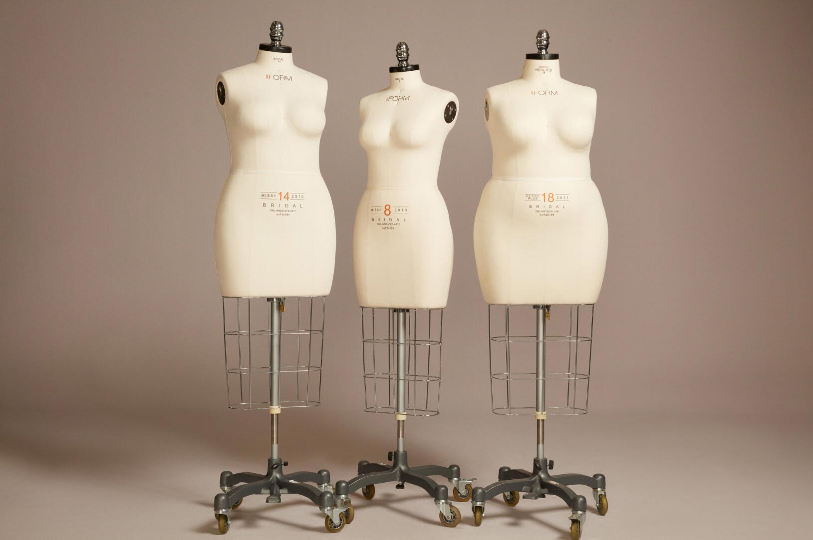 group of bustform mannequins next to each other