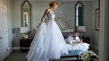 bride and groom in the hotel suite @thebiltmoremiami