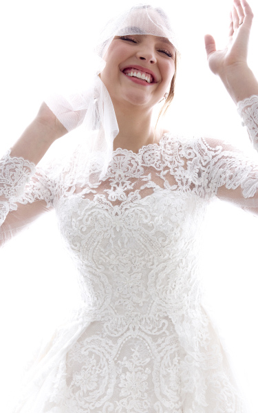closeup of bride in veil smiling