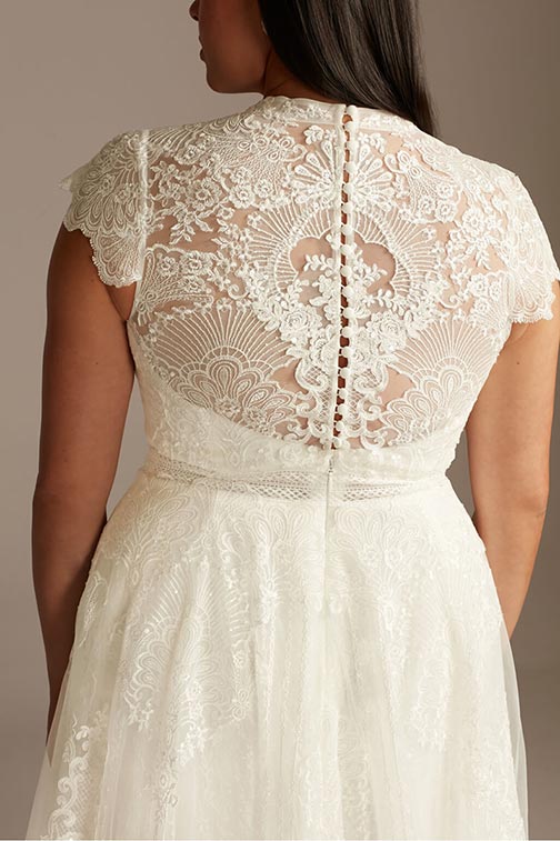closeup of the back of a lacy wedding dress