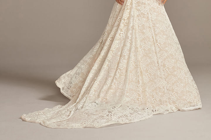 lower back portion of a lacy wedding dress
