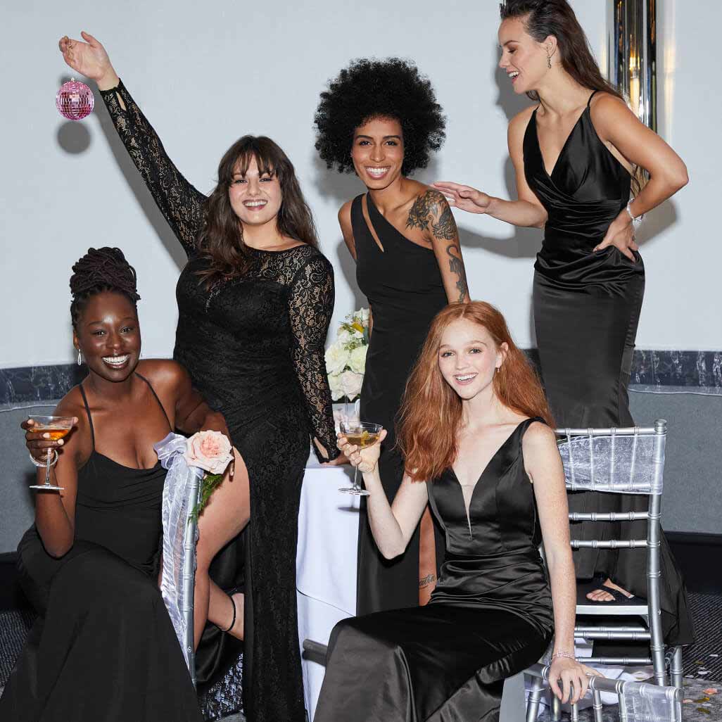 group of women at reception wearing different black dresses