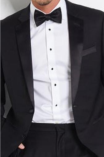 man wearing black tuxedo and bow tie