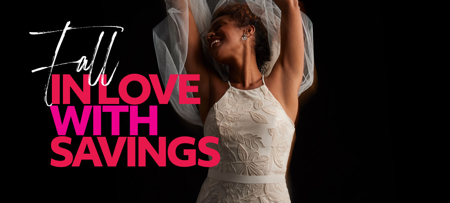 bride on black background throwing her hands up promoting fall in love with savings
